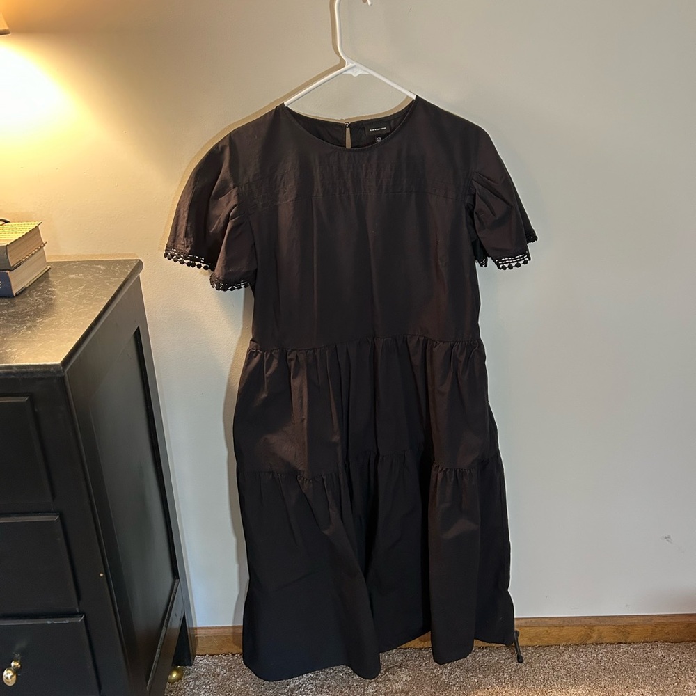Chic Black Dress with Ruffle Sleeves